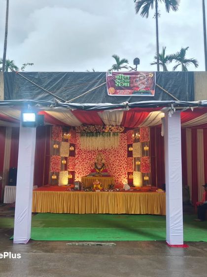 An outdoor Ganpati pandal setup. I build the structure and decorate it completely, including the stage for the idol and seating for devotees.