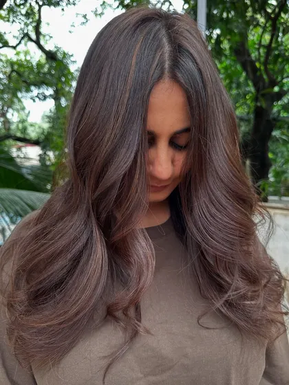 A classic 'Chestnut Brown'. This is a timeless and elegant color that suits so many skin tones. It’s rich, warm, and full of shine.