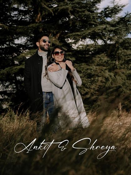 A happy, candid moment from the pre-wedding shoot in Shimla. The couple's smiles and the natural setting make this a perfect memory of their time in the mountains.