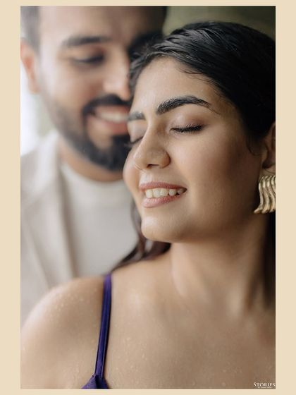 A dreamy, soft-focus portrait of the couple, conveying a sense of peace and deep connection.