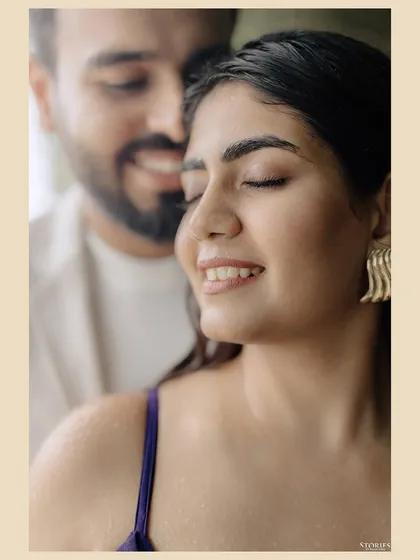 A dreamy, soft-focus portrait of the couple, conveying a sense of peace and deep connection.