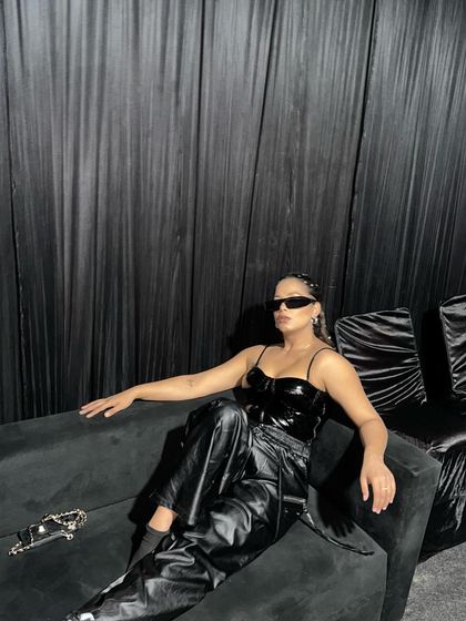 My look for hosting Sunburn. This all-black leather and latex outfit was edgy, cool, and perfect for a high-energy music festival.