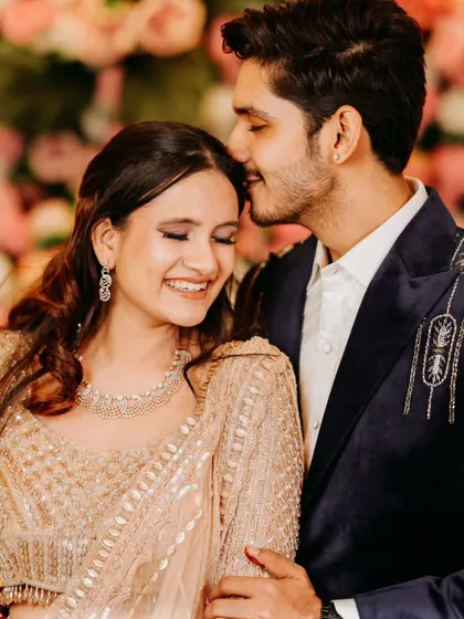 A sweet and intimate moment during the reception, with the groom whispering to his bride. We are always looking for these unposed, genuine interactions.