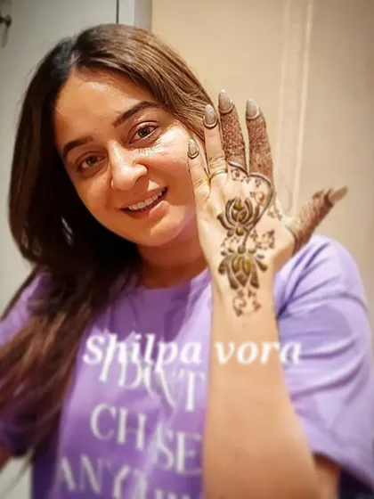 A happy client, actress Mahhi Vij, showing off her simple yet elegant lotus mehndi. I cater to all requests, from full bridal to minimalist designs.