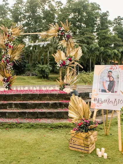 A personalized welcome sign and floral arrangements greet guests, setting the stage for the romantic surprise to come.