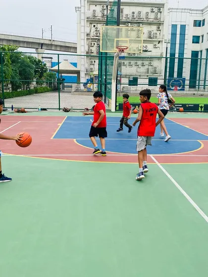 A player practices dribbling on the move.