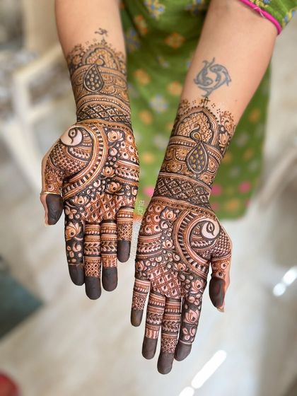 Another angle of this intricate peacock design, showing the fine details and the clean line work.