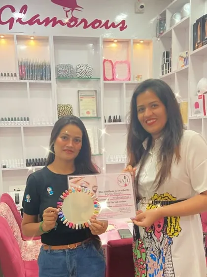 Another successful student from our out-of-town batch, proudly displaying her certificate and practice work.