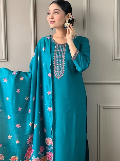 This aqua blue viscose chanderi kurta is so calming and beautiful. The printed floral dupatta adds a pop of color and freshness.