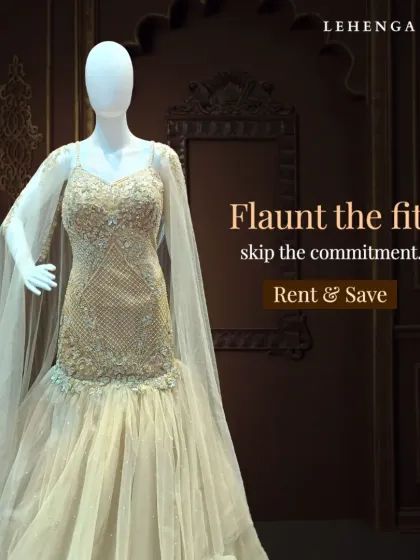 Flaunt the fit, skip the commitment. This champagne-colored mermaid gown with a sheer cape is designed to hug your curves beautifully, offering a red-carpet-worthy look for your special night.