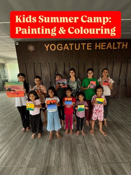 A group photo from our Kids Summer Camp's Painting & Colouring session. Their bright smiles and colorful artworks say it all.