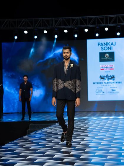 Walking for Pankaj Soni at Mysore Fashion Week. The focus is on a steady, confident stride to let the designer's work shine.