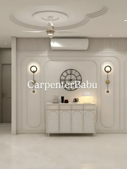 This image showcases the console and entryway of the Hiranandani apartment, emphasizing the cohesive design language with its clean lines and classic wall molding.