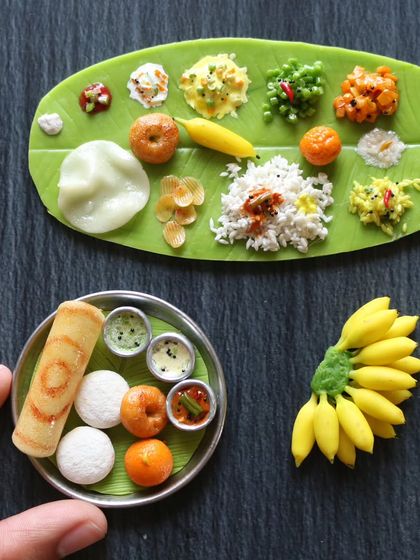 A close-up of a South Indian breakfast platter and a full banana leaf meal, showing the intricate details.