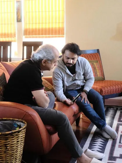 Here, my Guruji, Pt. Yogesh Samsi ji, shares a piece of music with me on his phone. Technology changes, but the tradition of a Guru sharing knowledge with his shishya remains eternal.