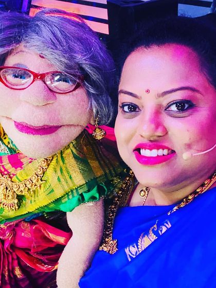 A lovely picture with Ajji in her beautiful blue saree for a TV appearance. The camera loves her.