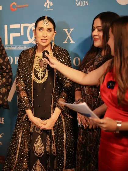 Actress Karisma Kapoor being interviewed at a fashion event where my students managed the backstage artistry. This is the world you will become a part of, a world of glamour, fashion, and creativity.
