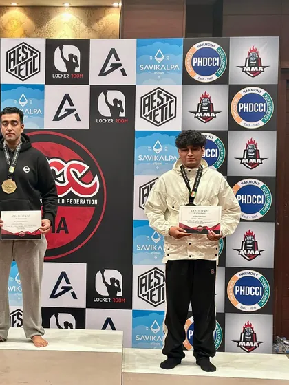 Two of our competitors sharing the podium. Training together, competing together, and winning together.