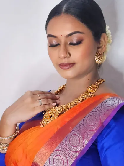 Another angle of my self-makeup look, with eyes closed to show the blended eyeshadow.