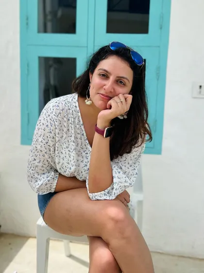 A more thoughtful pose from the same casual photoshoot.