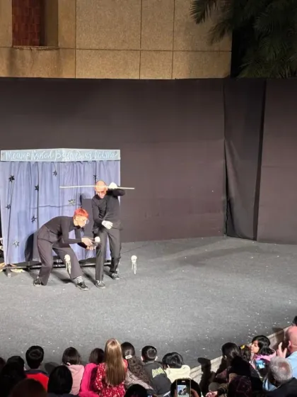 A comedic moment from 'Theatre in the Pocket', showcasing the expressive potential of marionettes in physical comedy.