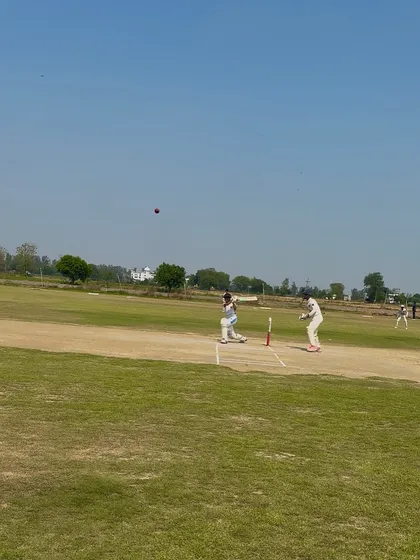 Aditi plays a shot, showcasing her excellent technique and timing.