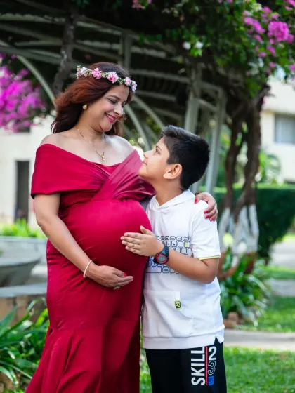 The bond between a mother and her child is so special. This portrait captures the soon-to-be big brother looking up at his mom with so much love and excitement.