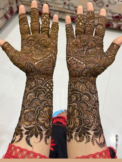 The beauty of a symmetrical design. Both hands are a mirror image, filled with my signature hibiscus and rose patterns.