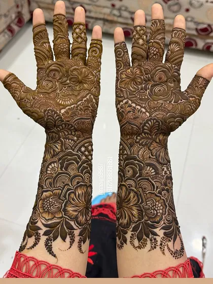 The beauty of a symmetrical design. Both hands are a mirror image, filled with my signature hibiscus and rose patterns.