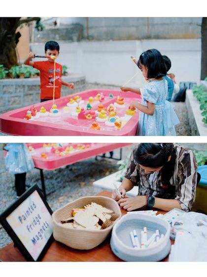 Kids enjoying some of the planned activities, including a 'fishing for ducks' game and a craft station for painting fridge magnets.