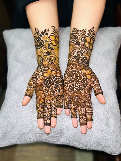 A beautiful bridal floral design with a mix of roses and other flowers. The patterns are elegant and timeless.