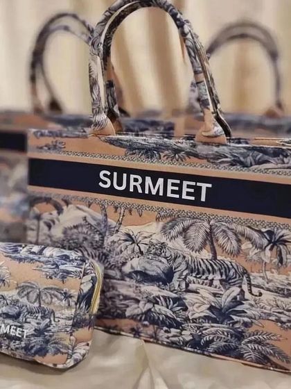 A beautiful personalised gift set featuring our popular tiger print tote bag and a matching pouch.