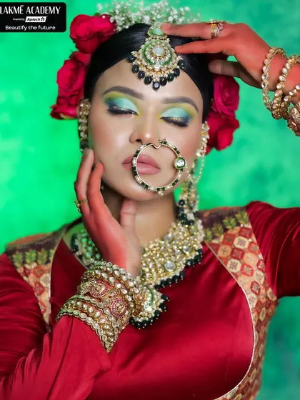 The closed-eye view of our Sabyasachi-inspired look, focusing on the vibrant green and yellow eyeshadow blend. This demonstrates the precision and artistic skill our students develop.