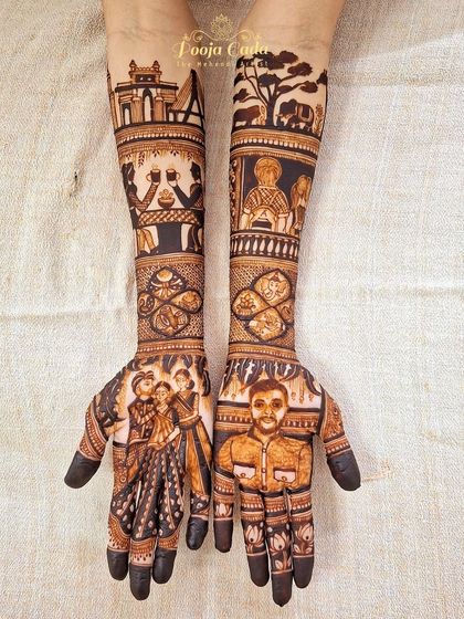 A design that celebrates a love story stretching from Nairobi to India. This customized bridal henna features portraits, the African safari skyline, and other personal elements that tell the couple's international love story.