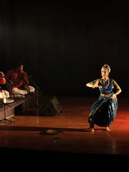 A full-scale production is a symphony of many arts coming together. Here you see me performing 'Ananta' with my live orchestra, a team of brilliant musicians whose energy is the very heartbeat of the performance.