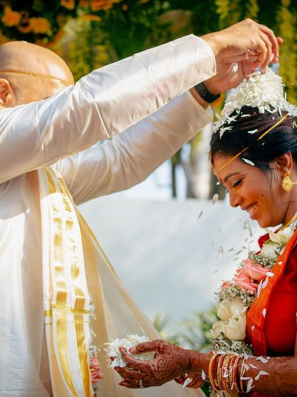 I have had the honor of hosting many beautiful South Indian weddings. The lush greenery and traditional decor elements, like floral arrangements and brass lamps, create an authentic and sacred atmosphere for the ceremony.