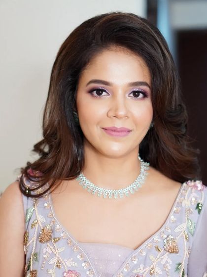 Nilofar's finished engagement look. The combination of shimmering eyes, defined brows, and a soft lip color creates a harmonious and stunning result.