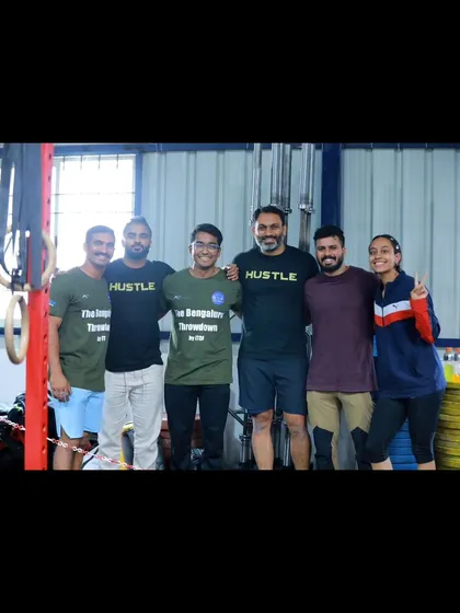 Another group photo of the team and coaches after the competition, capturing the pride and sense of accomplishment.