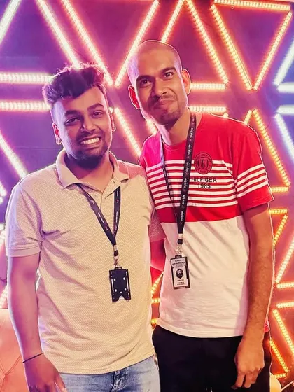 Posing with a team member during his work anniversary celebration. We foster a positive and supportive environment where every individual's contribution is recognized.