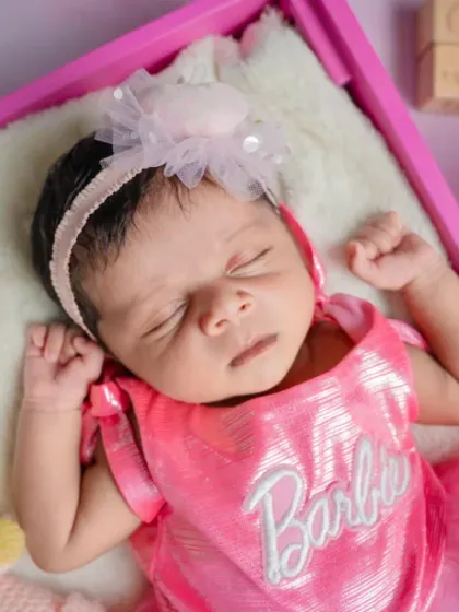 A real-life Barbie girl. I love the details in this setup, from the sparkly pink outfit to the tiny bunny friend, creating a dreamy, playful scene.