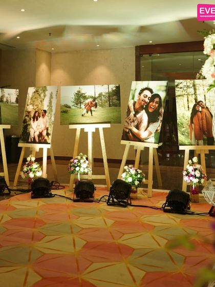 Another view of the photo gallery, showing how it can be integrated into the main event space to add a personal and narrative element to the decor.