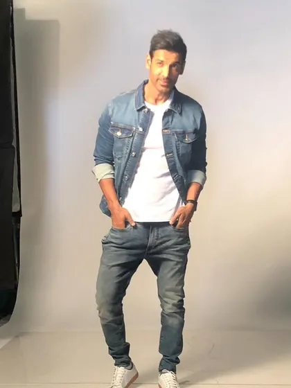 A classic and cool look I styled for John Abraham. The simple combination of a white t-shirt and a well-fitted denim jacket is timeless and showcases how I create effortless style for celebrity shoots.