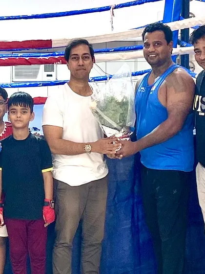 Our students and coaches felicitating our founder, Mr. Devraj Das. We are a team that celebrates each other's successes.
