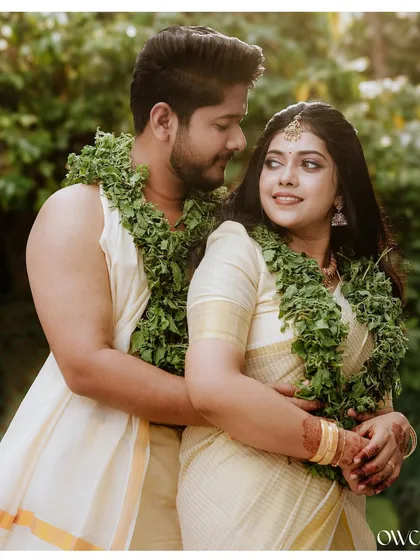 The sanctity and beauty of a traditional temple wedding. We capture the deep connection between the couple amidst the sacred atmosphere, highlighting the cultural richness of a Kerala wedding.