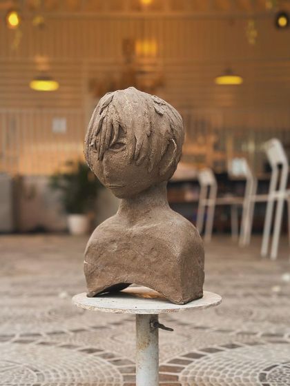 A stylized bust with expressive, anime-inspired features. Sculpting allows for so many different artistic interpretations.