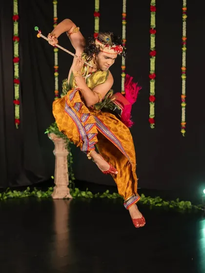 Another powerful mid-air pose from the "Murali Manohar" piece. Portraying Krishna, I focused on embodying his playful and powerful character through expressive movement.