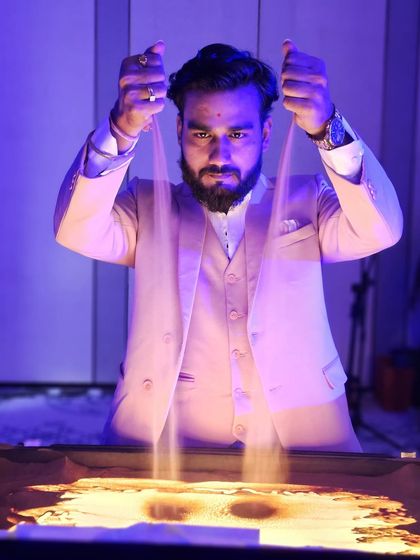 Pouring sand to begin a new story for the Protiviti event in Chennai. This is the moment where the magic begins, with just a lightbox and a handful of sand.