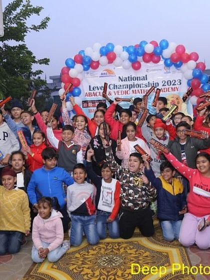 Students celebrating their participation in the championship. We believe that participation itself is a victory, building confidence and a love for learning.