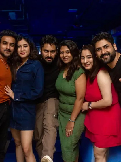 A big group of friends ready for a fun night out.