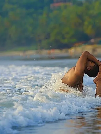 Practicing an advanced asana amidst the waves at Gokarna beach. The ocean teaches us that thoughts and feelings are like waves, they come and go. Through yoga, we find the part of us that remains constant and calm, even in the midst of movement.